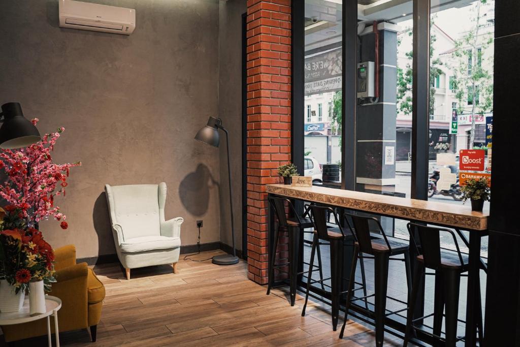 Posezení v ubytování Amigo Hotel