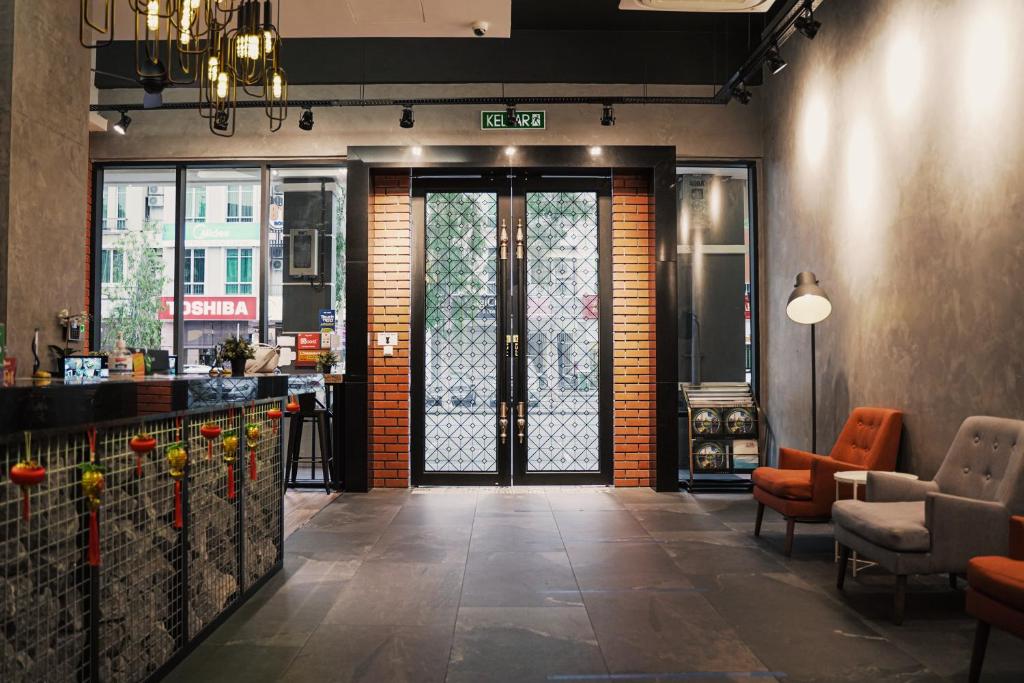 Posezení v ubytování Amigo Hotel
