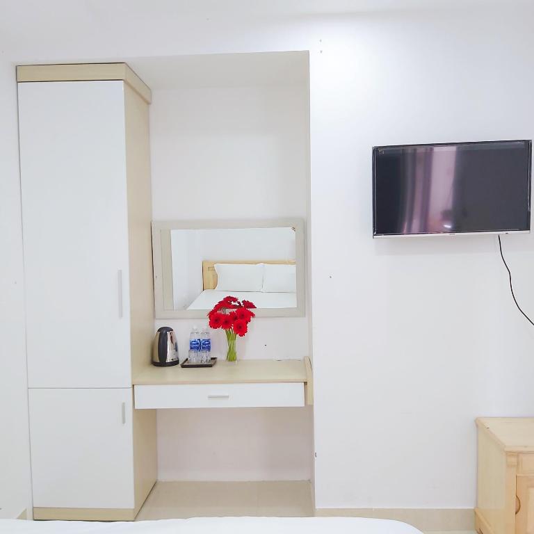 TV a/nebo společenská místnost v ubytování Daisy Dalat House