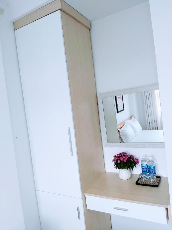Postel nebo postele na pokoji v ubytování Daisy Dalat House