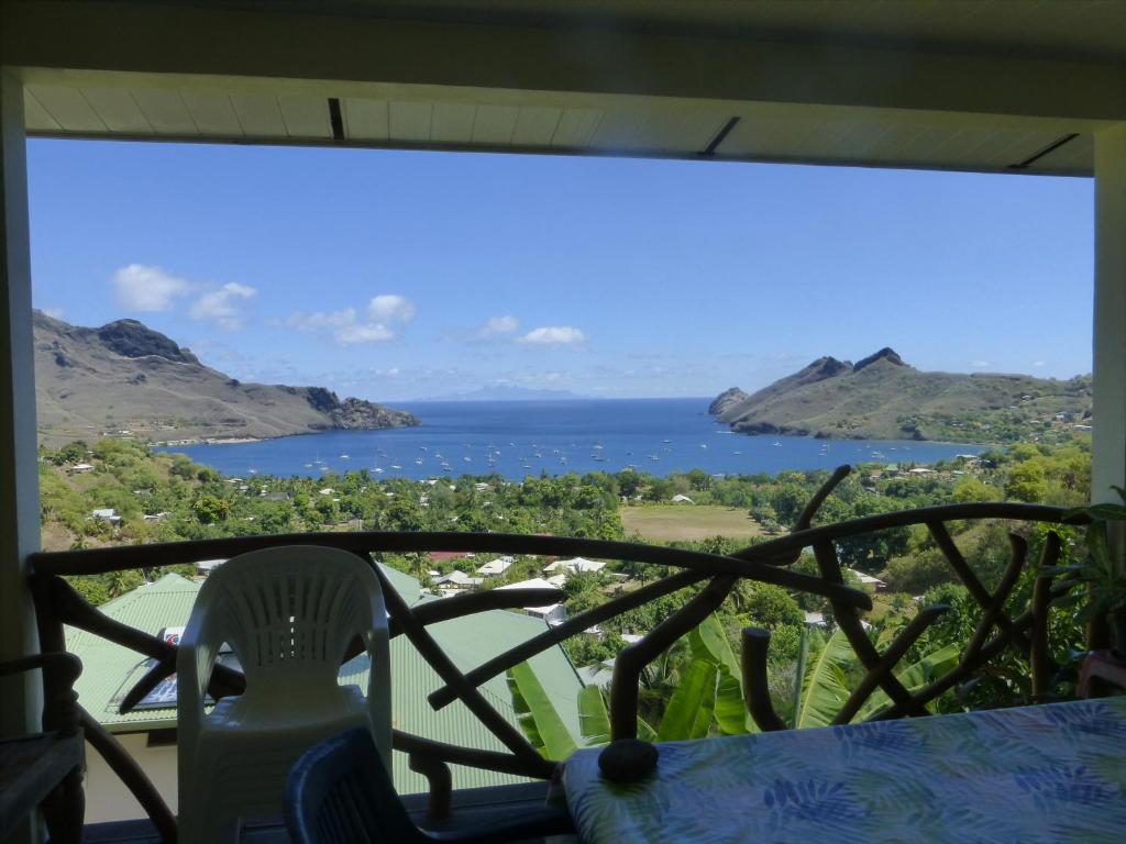 a view of the ocean from the porch of a house at Fare Manutea in Nuku Hiva