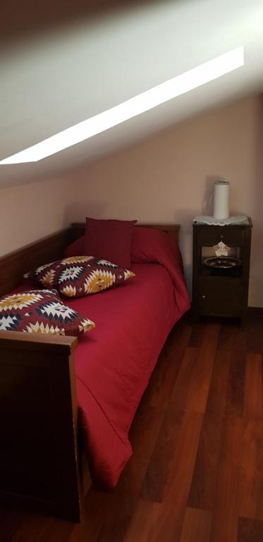 Postel nebo postele na pokoji v ubytování Sassi's Loft