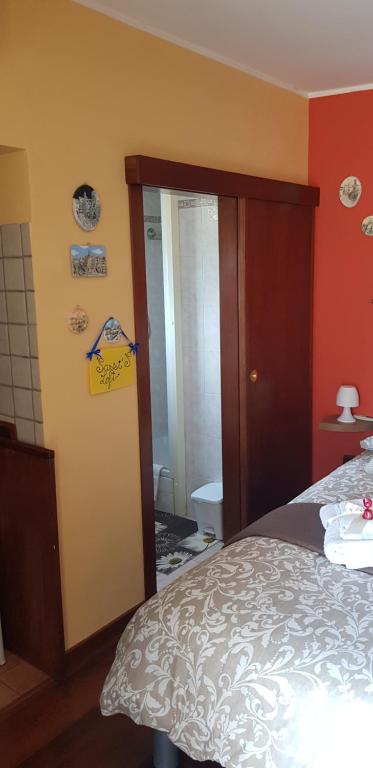 Postel nebo postele na pokoji v ubytování Sassi's Loft