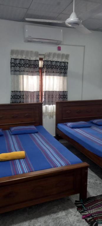 Postel nebo postele na pokoji v ubytování David Villa
