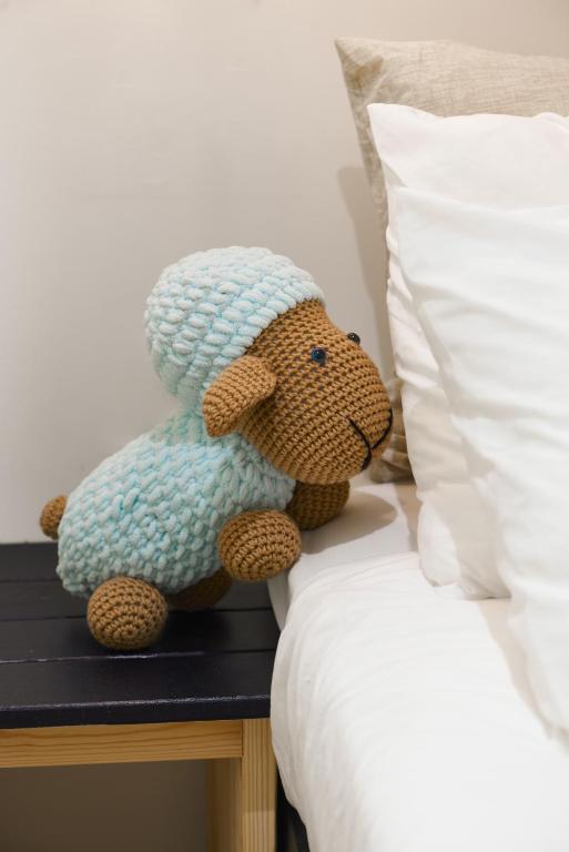 Postel nebo postele na pokoji v ubytování Tel-Aviv LALA Boutique Hotel
