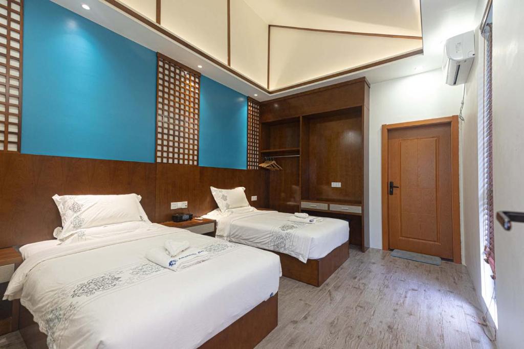Postel nebo postele na pokoji v ubytování Amphitrite Resort