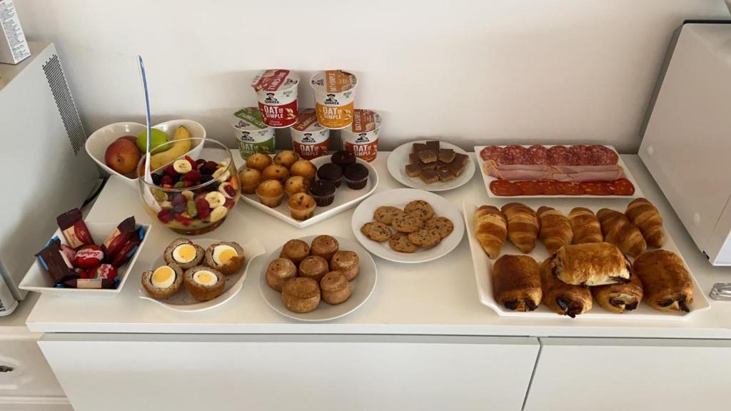a counter with a bunch of different types of food at Elysian Fields B&B in Helston