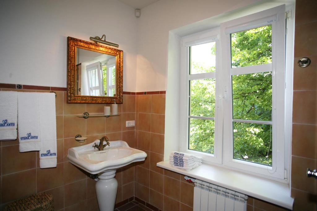 Koupelna v ubytování Aparthotel Stora Antis