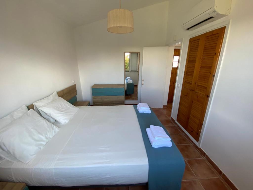 Posteľ alebo postele v izbe v ubytovaní Villa con piscina privada y gran jardín
