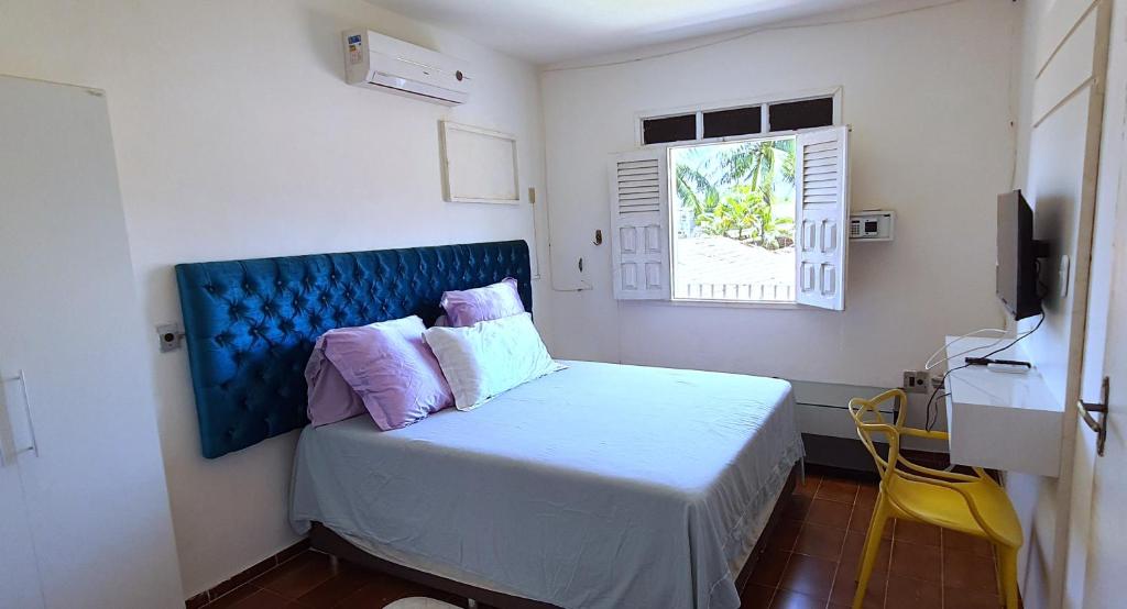 Katil atau katil-katil dalam bilik di Casa Charme Barra de São Miguel (5 Suítes com ar)