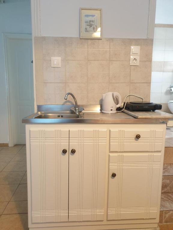 A cozinha ou kitchenette de Stella Nomikou Apartments