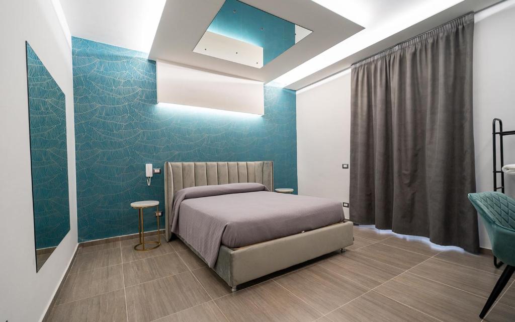 Postel nebo postele na pokoji v ubytování Intimity Luxury Rooms