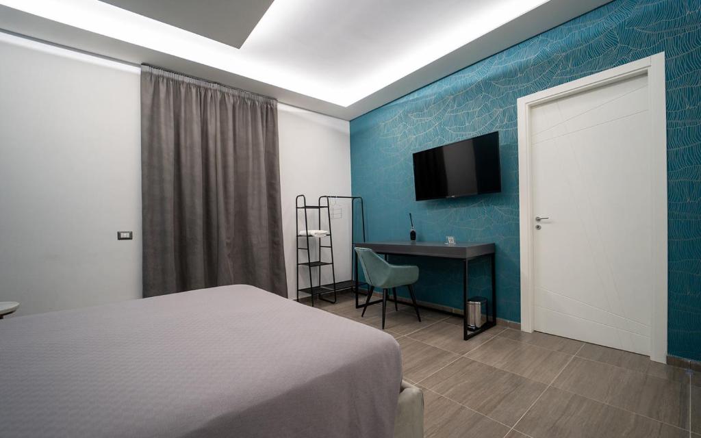 Postel nebo postele na pokoji v ubytování Intimity Luxury Rooms
