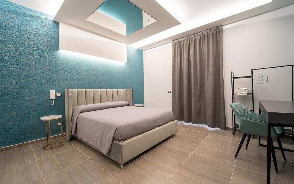 Postel nebo postele na pokoji v ubytování Intimity Luxury Rooms