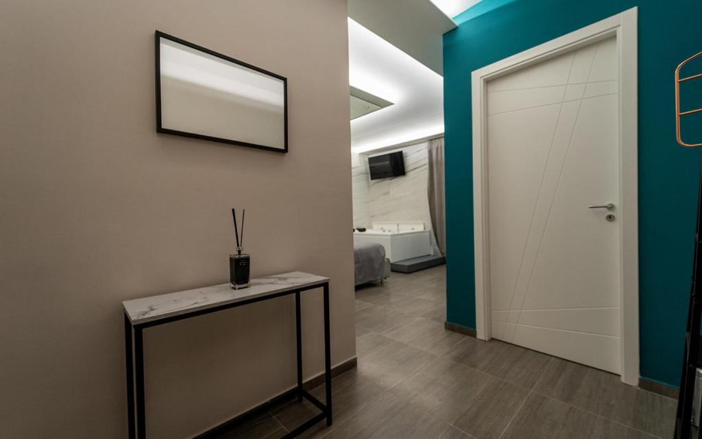 Postel nebo postele na pokoji v ubytování Intimity Luxury Rooms