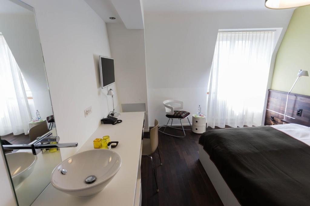 Llit o llits en una habitació de Design Hotel Plattenhof