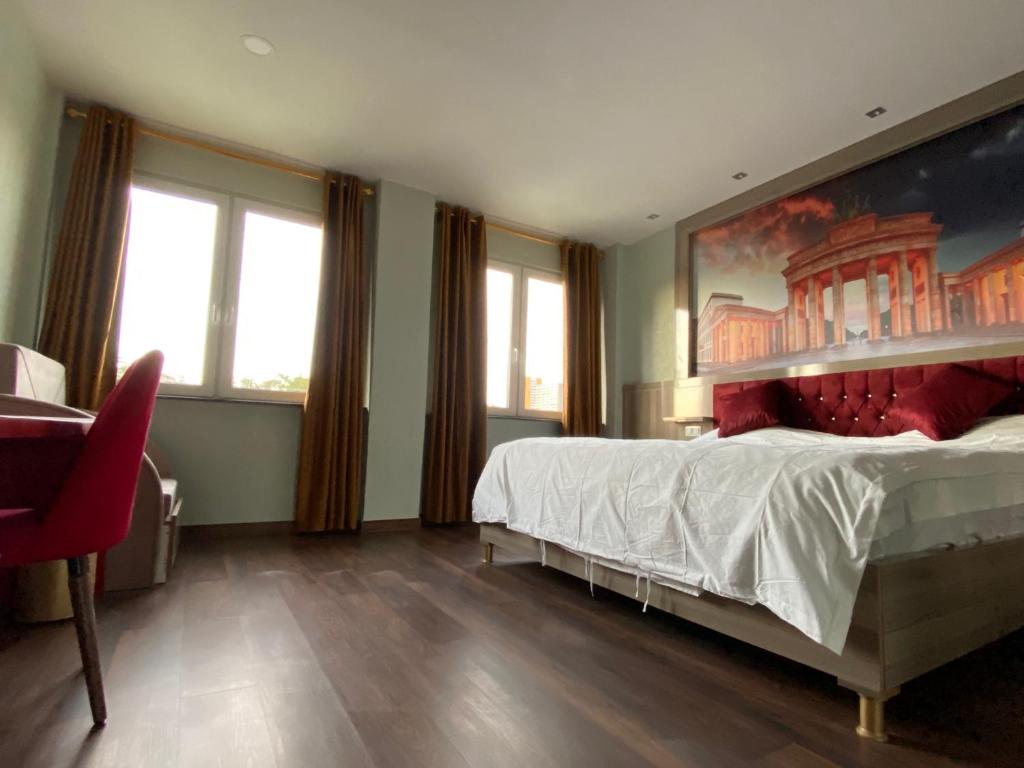 Hotel Grand Innにあるベッド