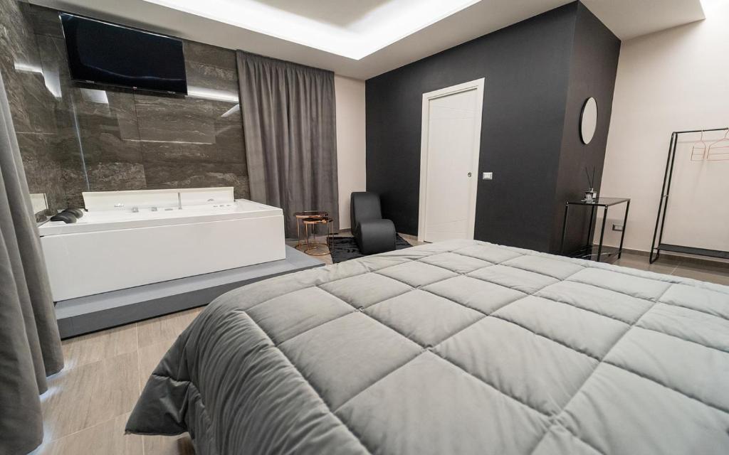 Postel nebo postele na pokoji v ubytování Intimity Luxury Rooms