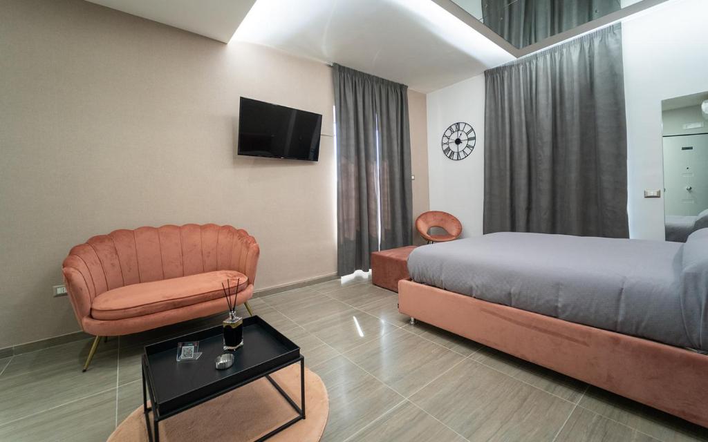 TV a/nebo společenská místnost v ubytování Intimity Luxury Rooms
