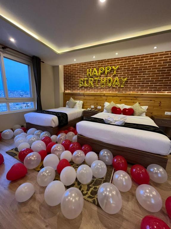 Postel nebo postele na pokoji v ubytování Hotel Kesu Home