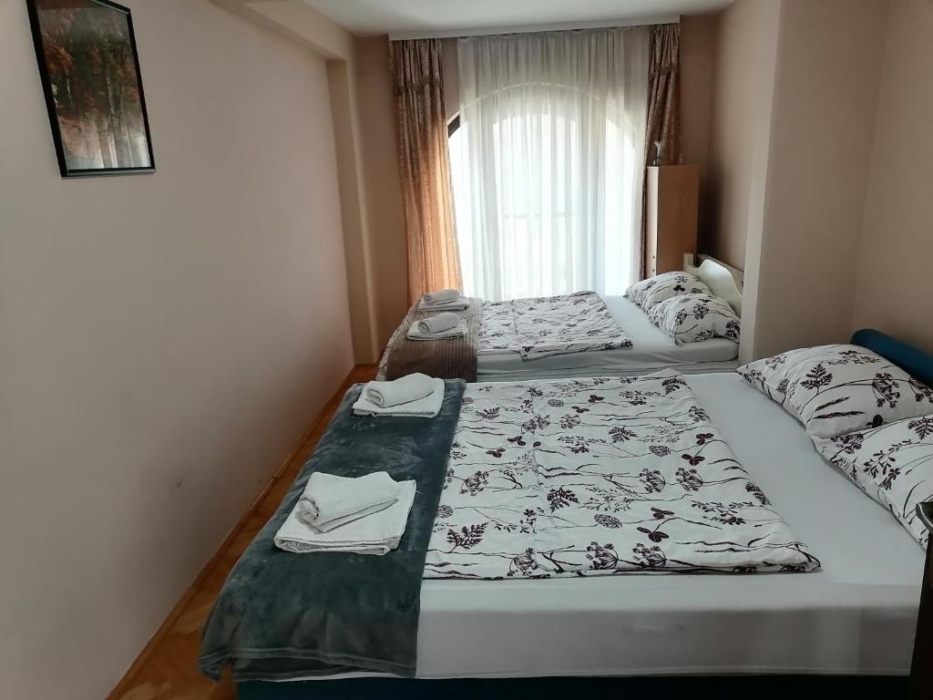 Voodi või voodid majutusasutuse Apartman Solomonovic toas