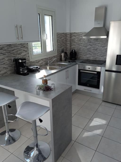 Kuchnia lub aneks kuchenny w obiekcie WONDERFULL SEA VIEW II