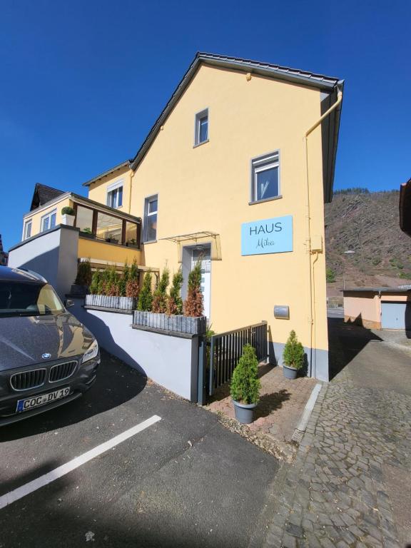 a house with a car parked in front of it at Haus Mika in Cochem