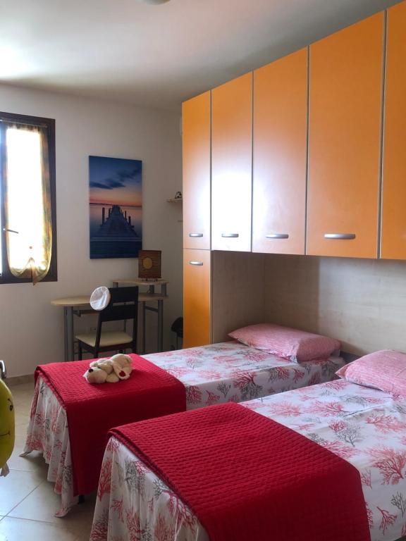 Postel nebo postele na pokoji v ubytování Dimora del Sole