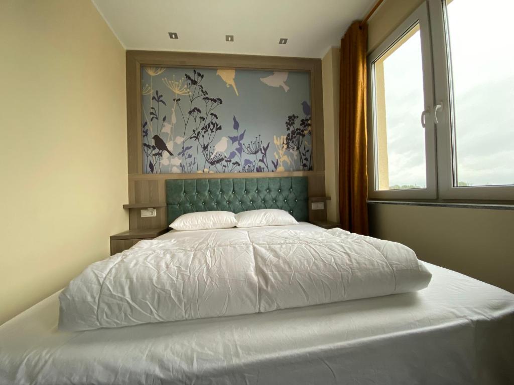 Hotel Grand Innにあるベッド