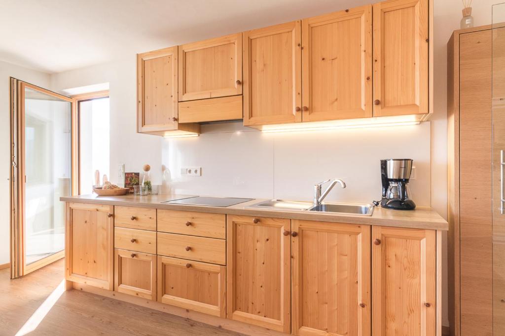 Kuchyň nebo kuchyňský kout v ubytování Appartements Kerschbaumer