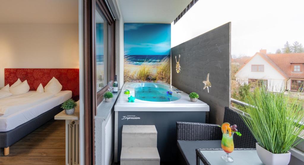 Postel nebo postele na pokoji v ubytování Hotel Am Kurpark Späth