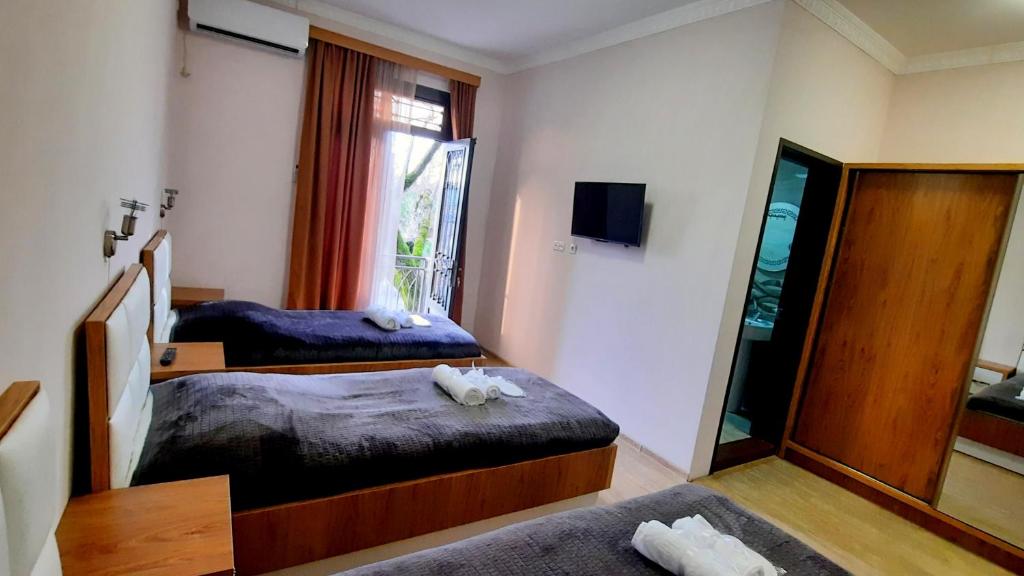 Postel nebo postele na pokoji v ubytování HOTEL KOSHKI