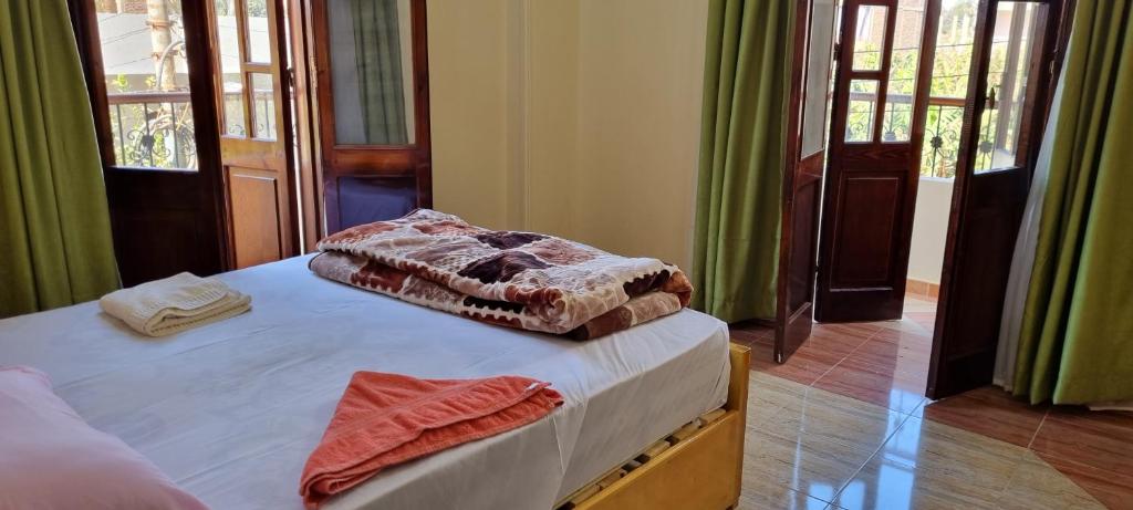 Postel nebo postele na pokoji v ubytování DREAM ISLAND Hotel