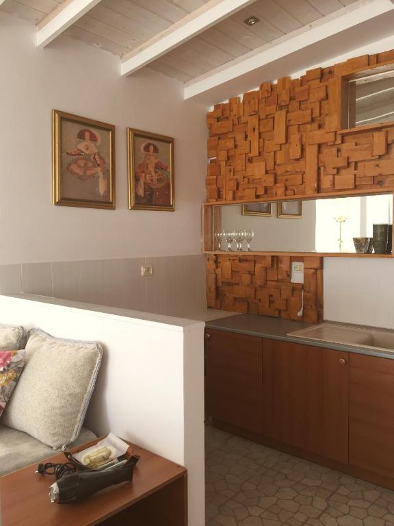 Kuchyň nebo kuchyňský kout v ubytování Olympia Hotel