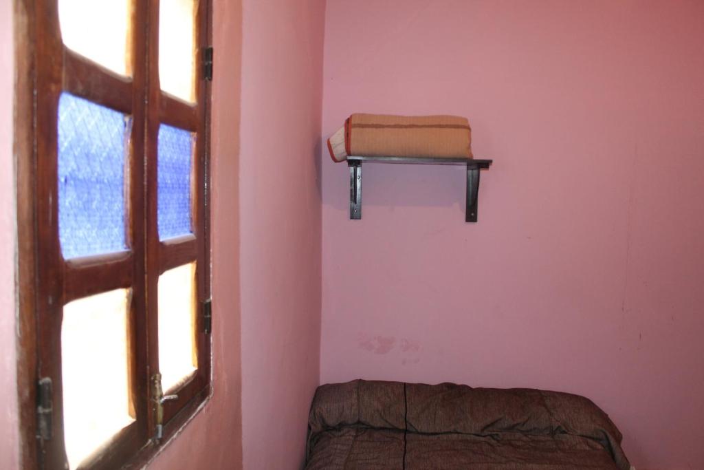 Chez l'habitant (Ba Omar) - Habitación Triple Básica Con Baño Compartido