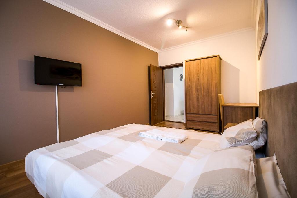 Posteľ alebo postele v izbe v ubytovaní Thermal Next II Weninger Apartman Kiskunhalas