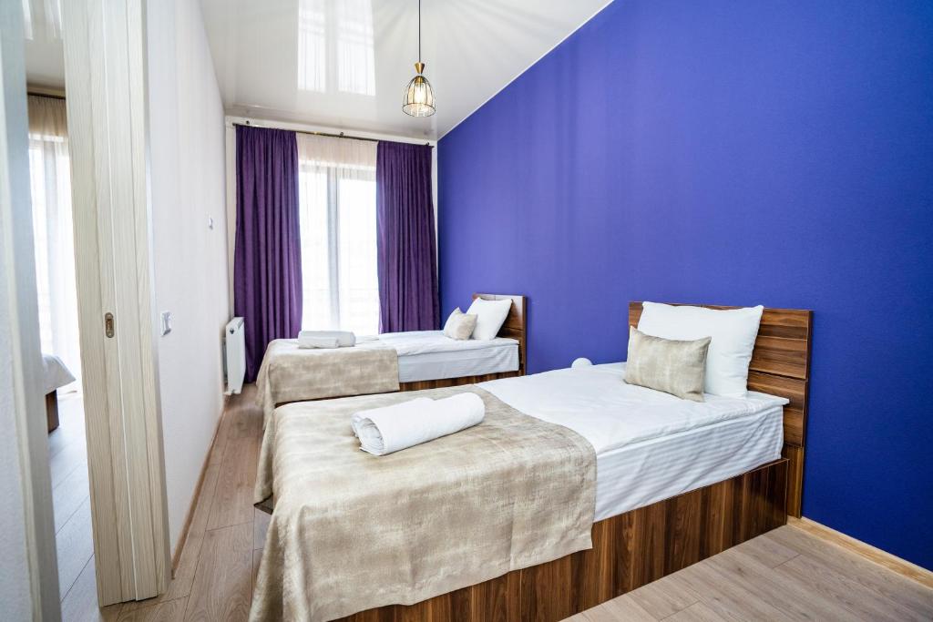 Postel nebo postele na pokoji v ubytování Eltisy Guest House