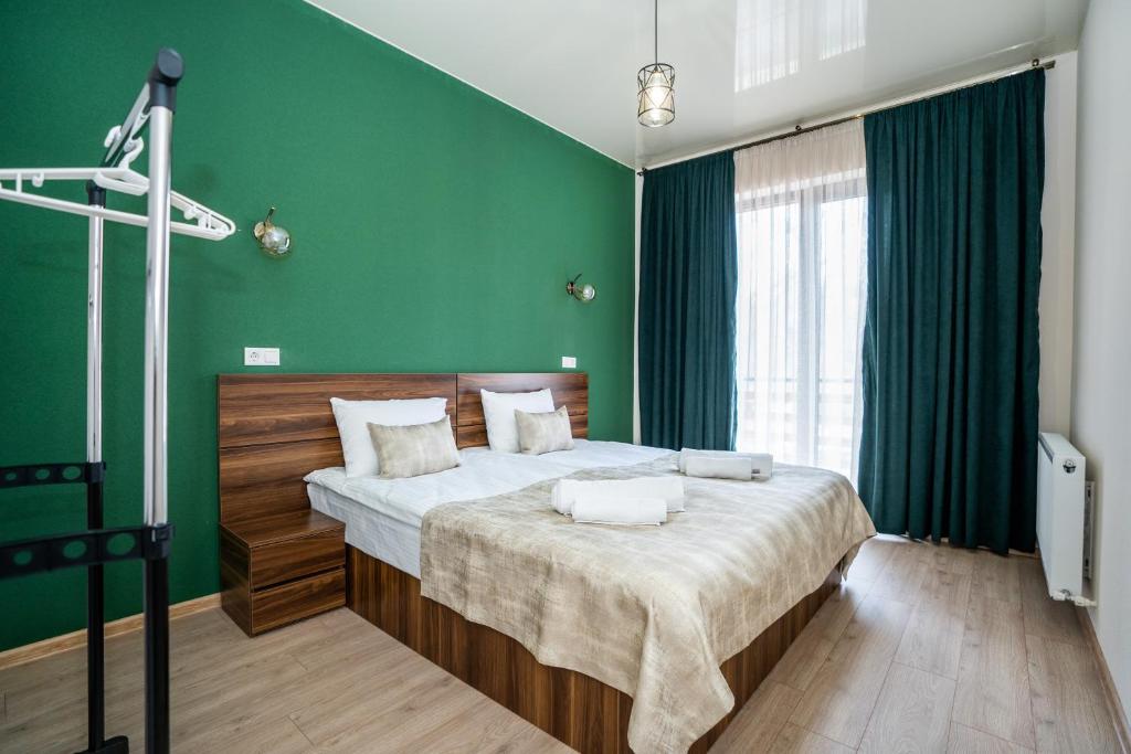 Postel nebo postele na pokoji v ubytování Eltisy Guest House
