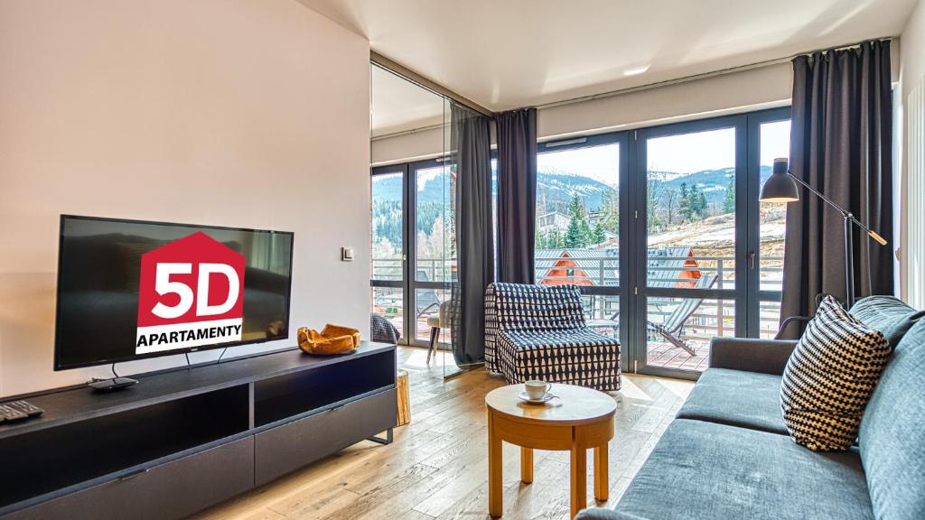 TV a/nebo společenská místnost v ubytování Apartament Triventi 99 z Widokiem - 5D Apartamenty