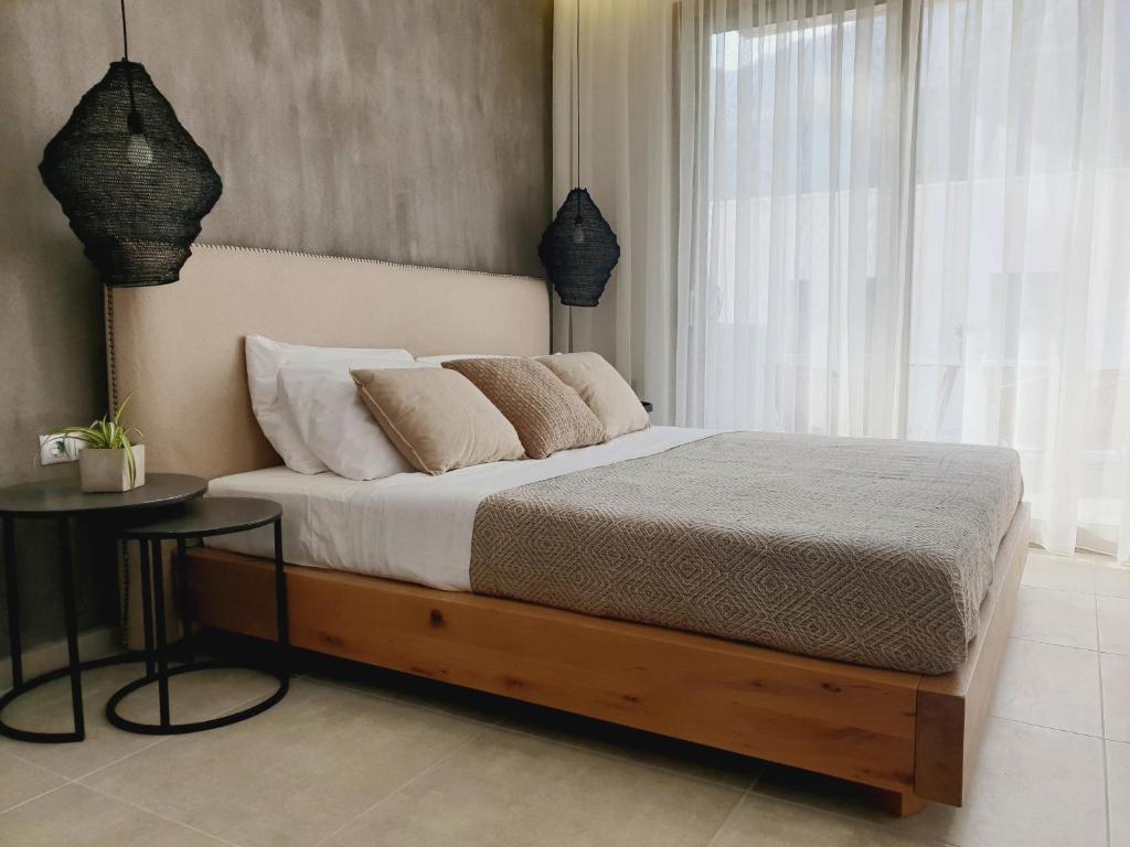 Postel nebo postele na pokoji v ubytování Soho Exclusive Suites