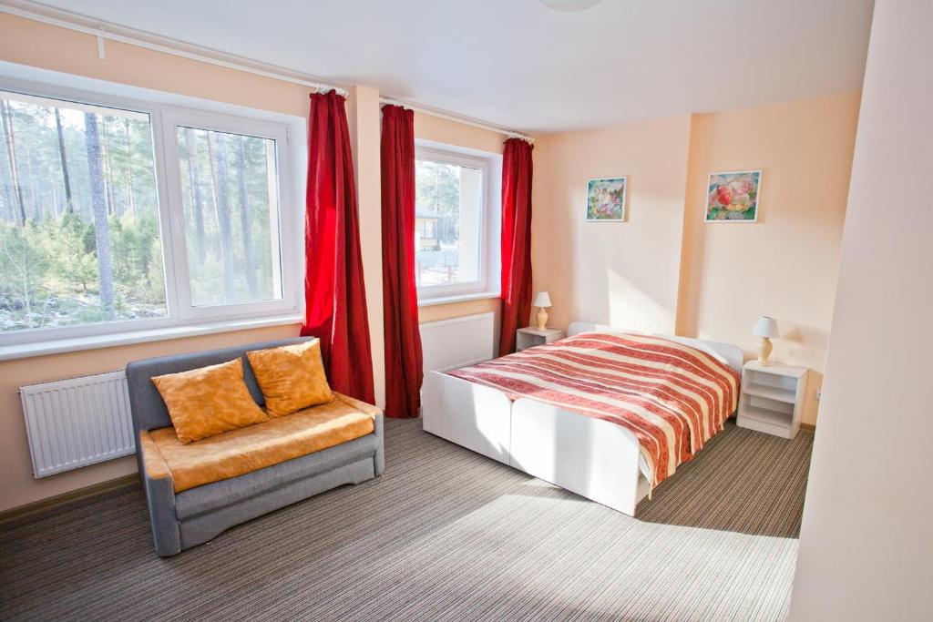 Postel nebo postele na pokoji v ubytování Idilė Bed & Breakfast - Visaginas
