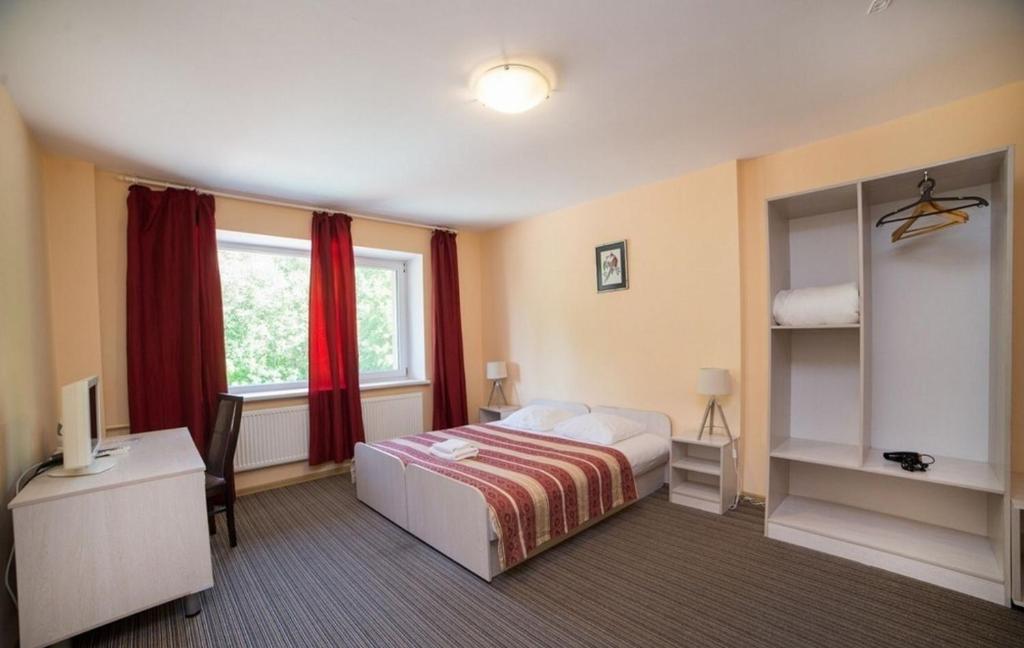 Postel nebo postele na pokoji v ubytování Idilė Bed & Breakfast - Visaginas