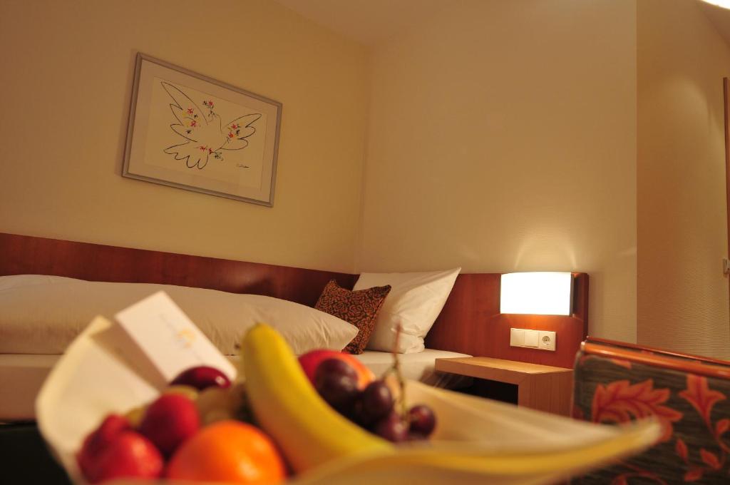Postel nebo postele na pokoji v ubytování Hotel Flandrischer Hof