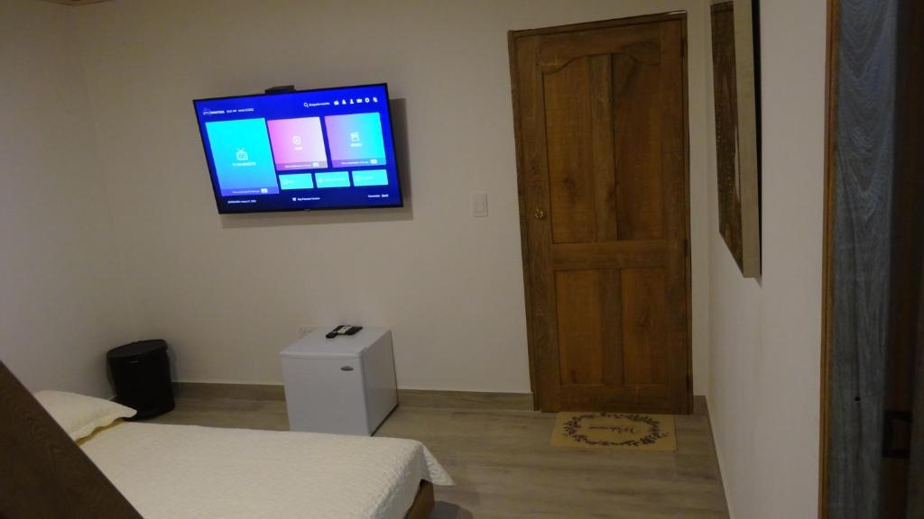TV a/nebo společenská místnost v ubytování Aparta Suite Villa Roko