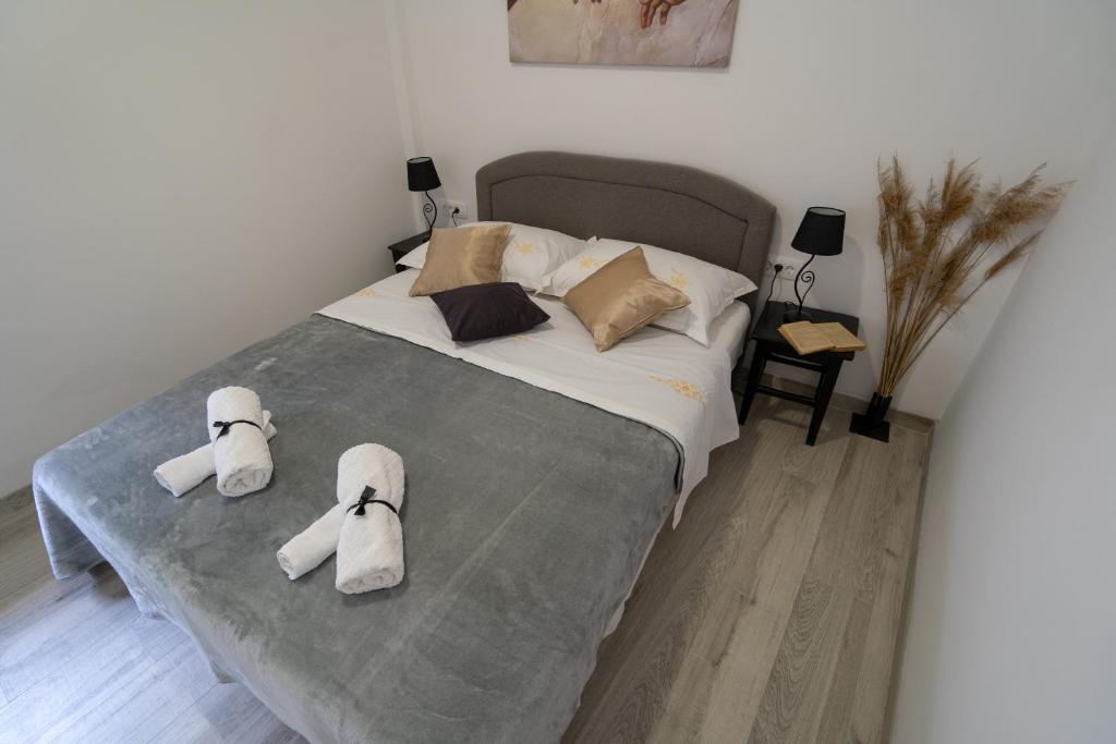 Katil atau katil-katil dalam bilik di Apartman TONKOVIĆ