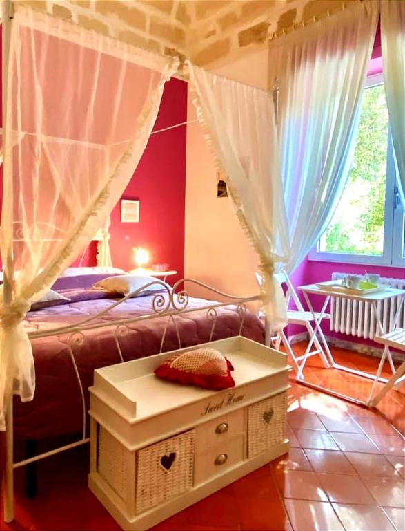 Posteľ alebo postele v izbe v ubytovaní Aedes B&B Il Giardino dei Sogni