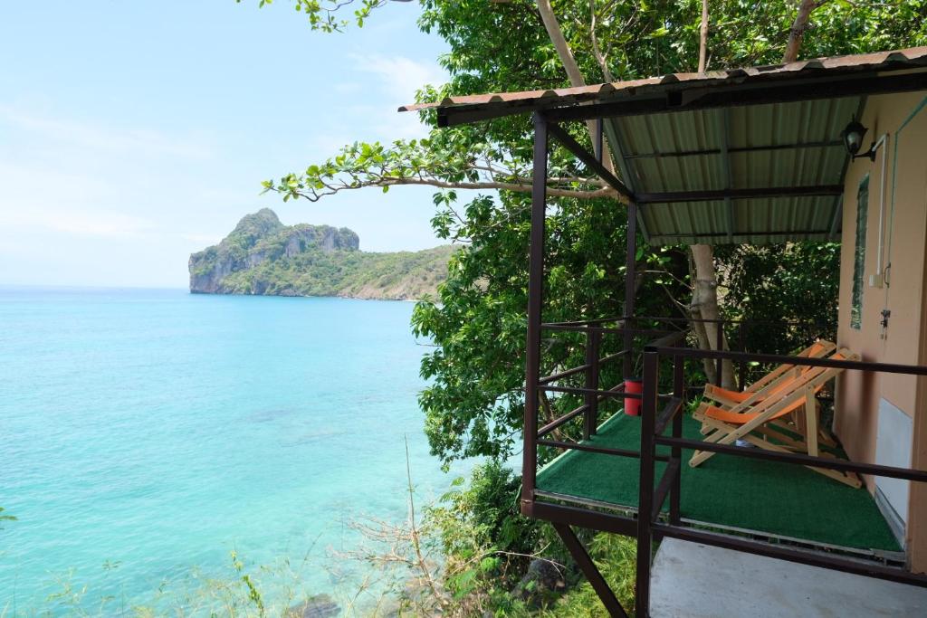 a room with a view of the ocean at Phi Phi Seaside Bungalow in Phi Phi Islands