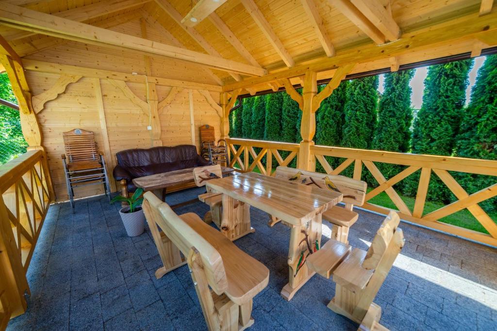 Posedenie v ubytovaní Villa Mikołajki Popiełuszki 8