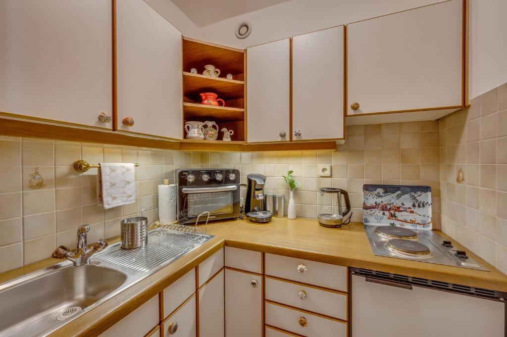 Kuchyňa alebo kuchynka v ubytovaní Apartments Olympiastraße