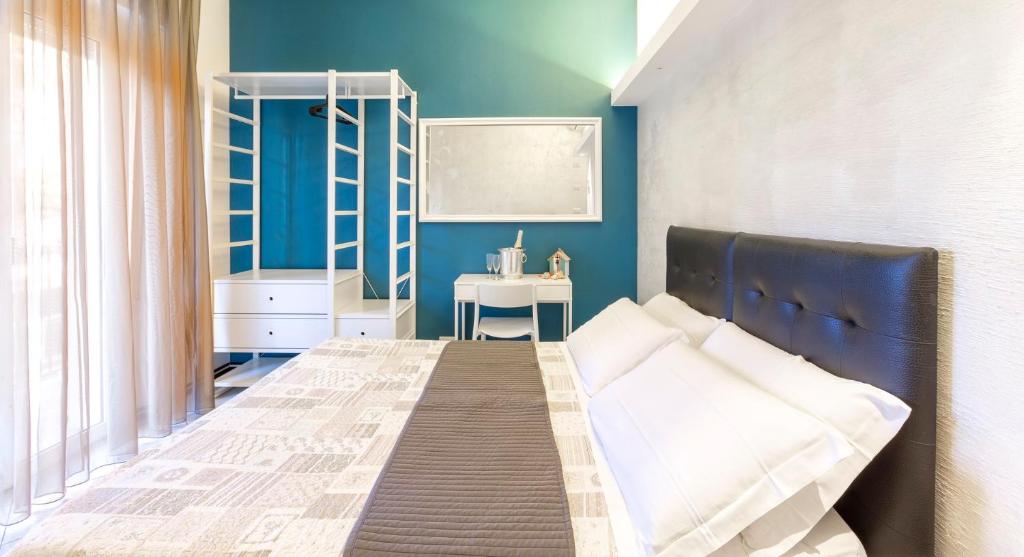 Postel nebo postele na pokoji v ubytování Hotel La Nidiola